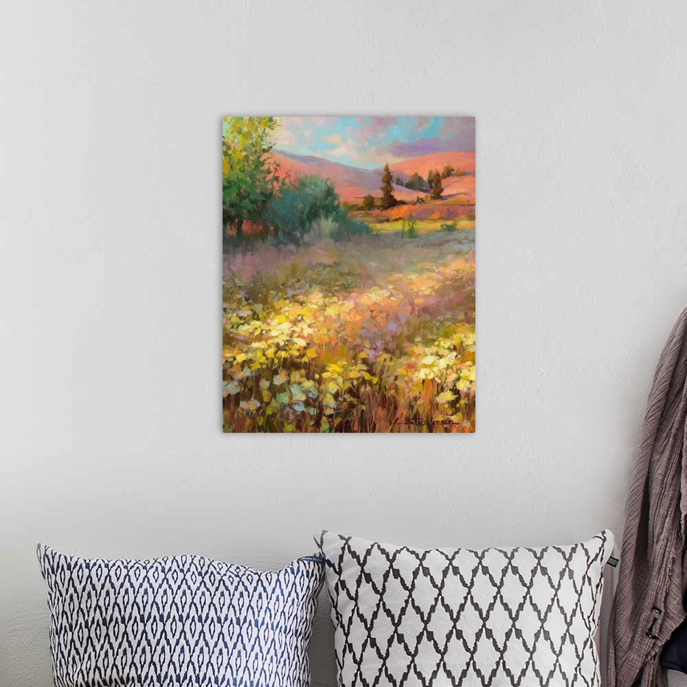 A bohemian room featuring Traditional impressionist landscape of a springtime field of wildflowers, with the hills in the b...