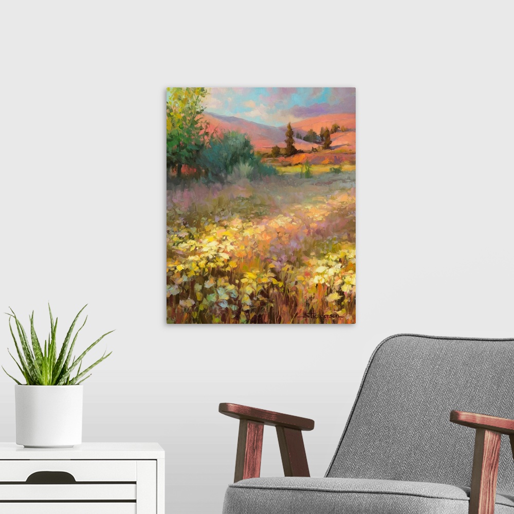 A modern room featuring Traditional impressionist landscape of a springtime field of wildflowers, with the hills in the b...