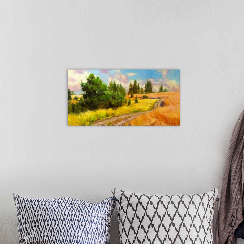 A bohemian room featuring Traditional impressionist landscape painting of a country dirt road winding through a golden mead...