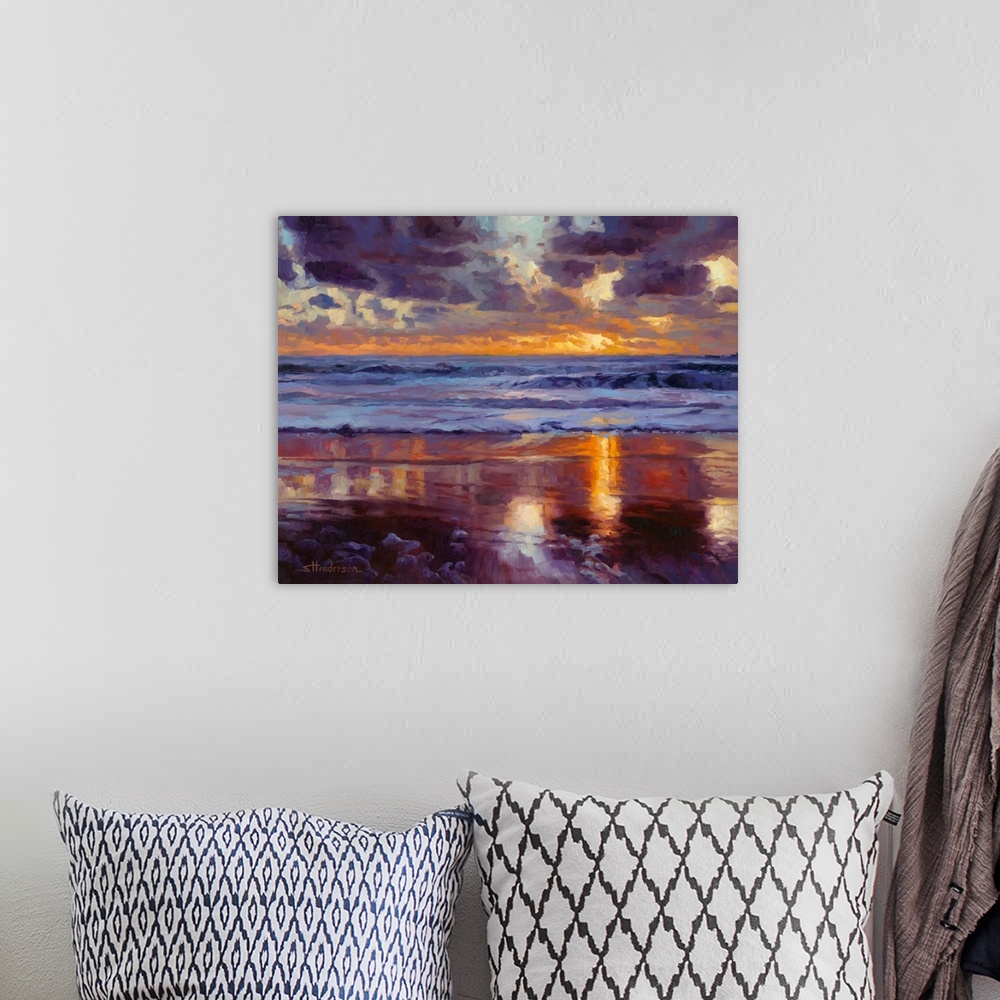 A bohemian room featuring Traditional impressionist painting of a beach at sunset, showing sand, water, and sky in varying ...