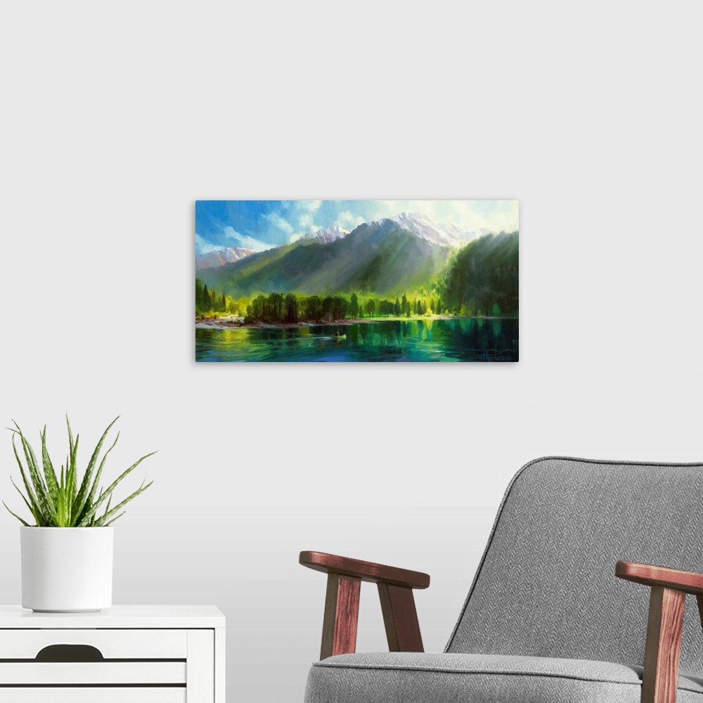 A modern room featuring Traditional representational painting of a man in a canoe, paddling on a still lake that is surro...