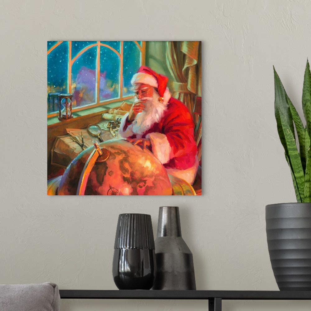 A modern room featuring Traditional representational holiday Christmas painting of Santa in his workshop, holding up a ma...