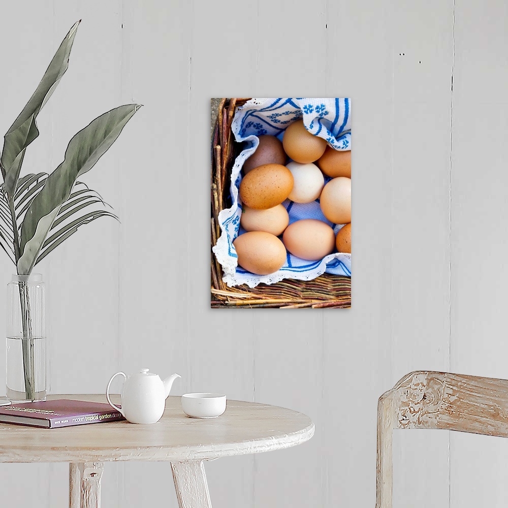 A farmhouse room featuring Brown hen's eggs in a basket