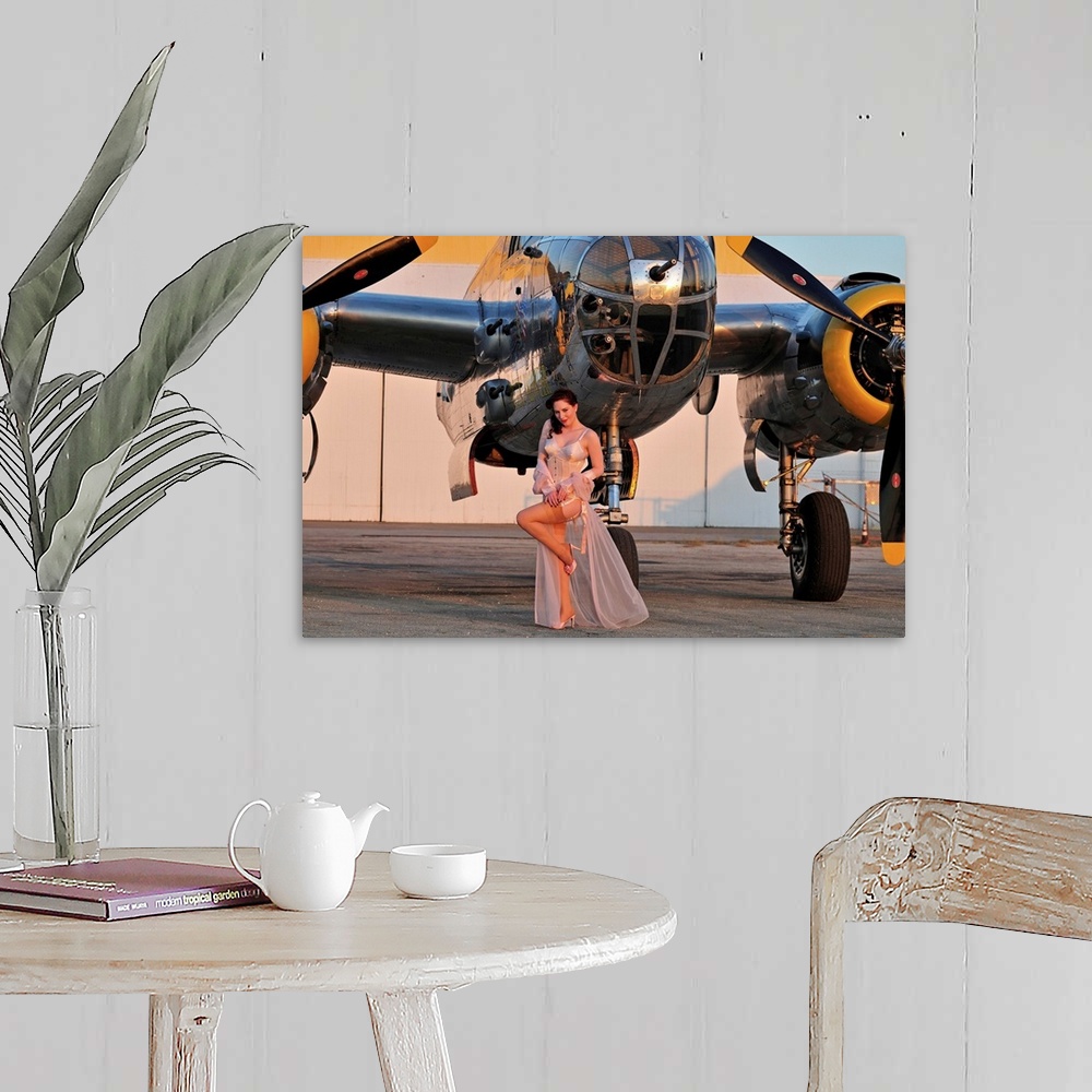 A farmhouse room featuring Sexy 1940's pin-up girl in lingerie posing with a B-25 bomber.