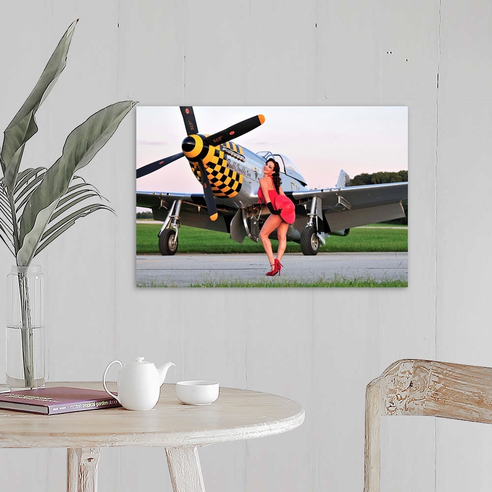 A farmhouse room featuring Sexy 1940's style pin-up girl posing with a P-51 Mustang fighter plane.
