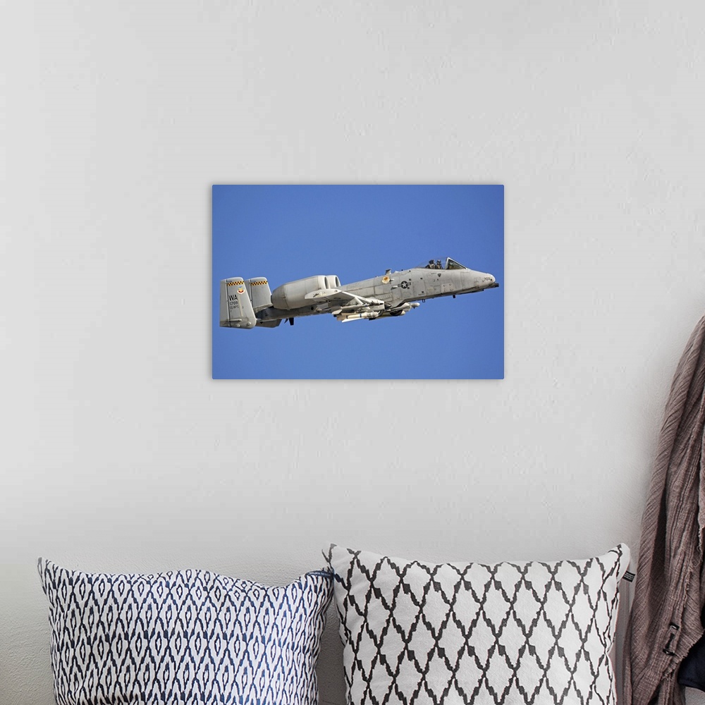 A bohemian room featuring A-10 C Thunderbolt II flying over Nevada.