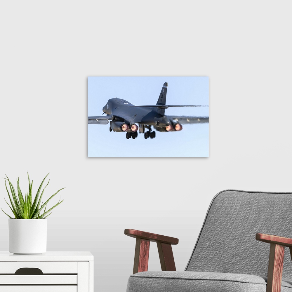 A modern room featuring A B-1B Lancer of the U.S. Air Force taking off from Nellis Air Force Base, Nevada.