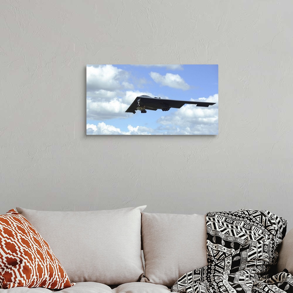A bohemian room featuring June 8, 2014 - A B-2 Spirit prepares to land on the runway at RAF Fairford, England. The B-2 Spir...