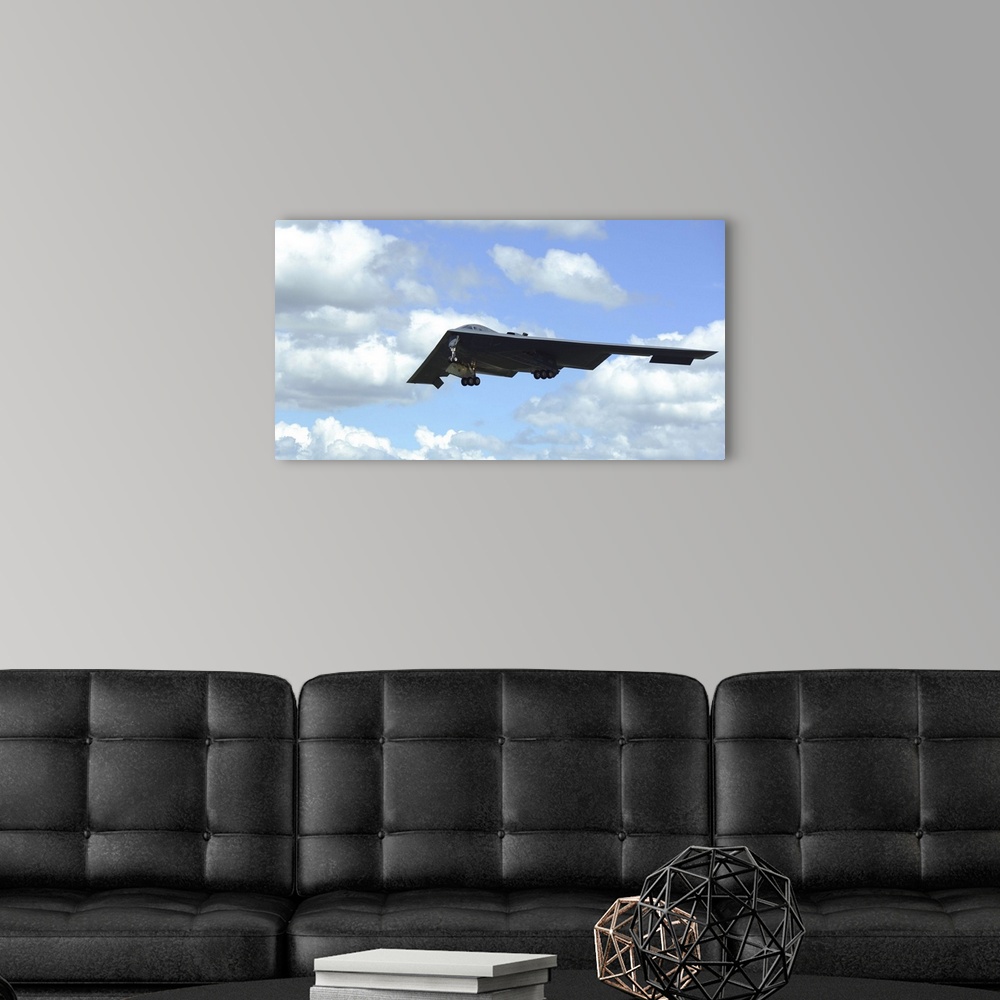 A modern room featuring June 8, 2014 - A B-2 Spirit prepares to land on the runway at RAF Fairford, England. The B-2 Spir...