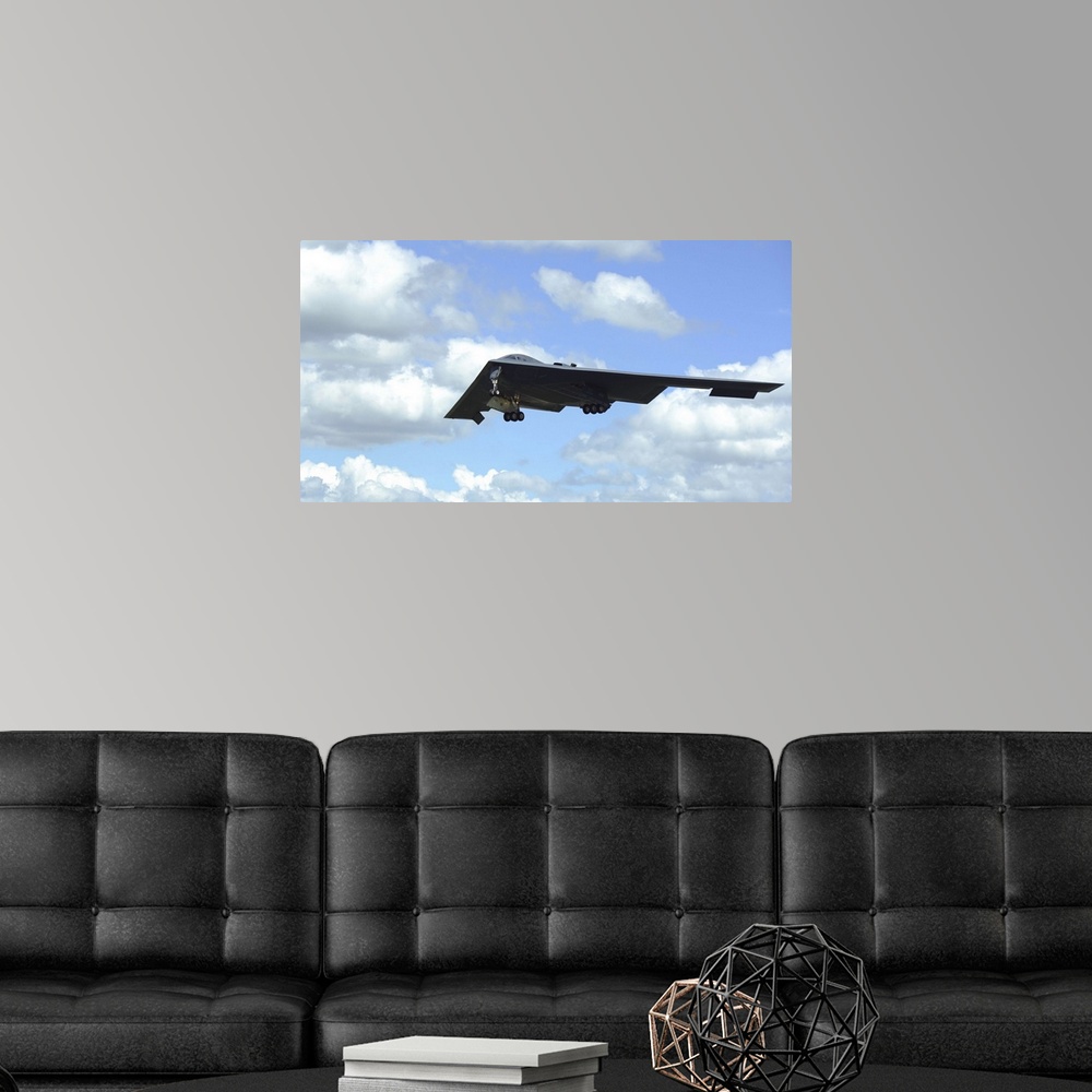 A modern room featuring June 8, 2014 - A B-2 Spirit prepares to land on the runway at RAF Fairford, England. The B-2 Spir...