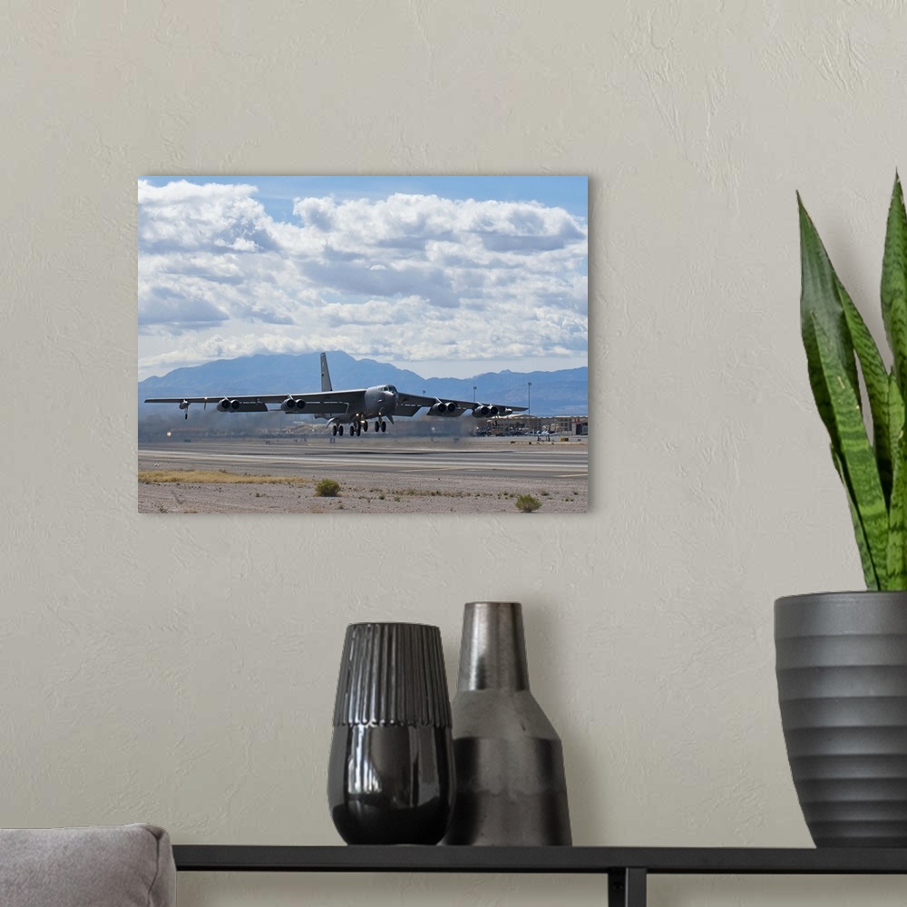 A modern room featuring March 4, 2014 - A B-52 Stratofortress takes off during Red Flag 14-2 at Nellis Air Force Base, Ne...