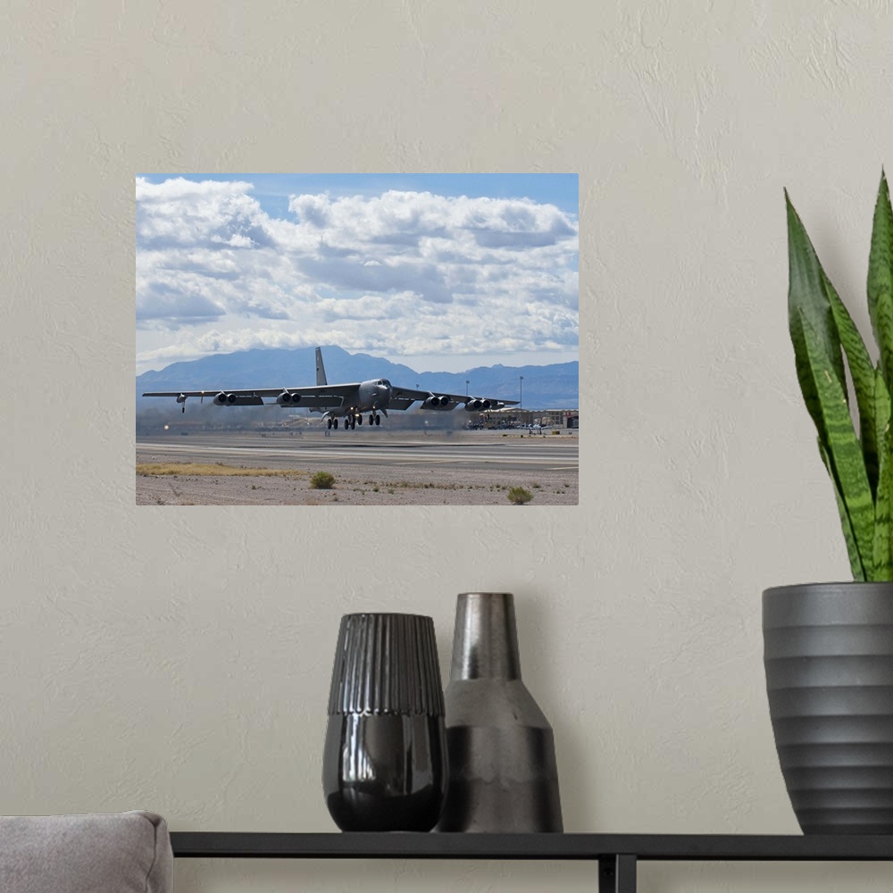 A modern room featuring March 4, 2014 - A B-52 Stratofortress takes off during Red Flag 14-2 at Nellis Air Force Base, Ne...