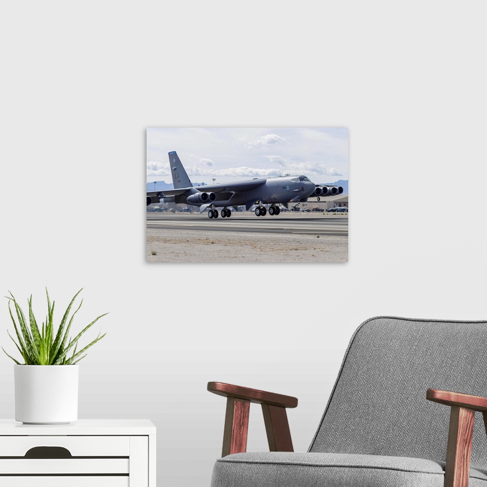 A modern room featuring A Boeing B-52 Stratofortress of the U.S. Air Force gets airborne from Nellis Air Force Base, Nevada.