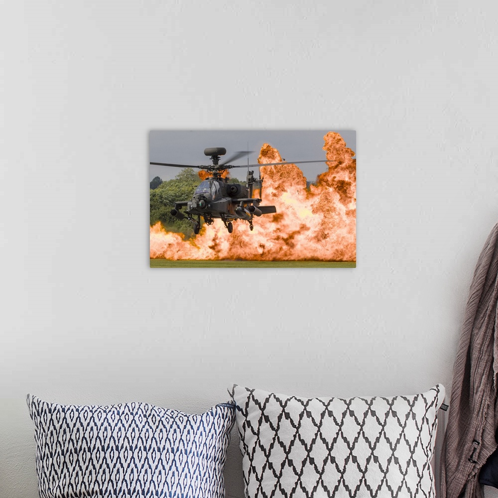 A bohemian room featuring A British Army WAH-64D Apache in front of a wall of fire at RAF Fairford in the United Kingdom.