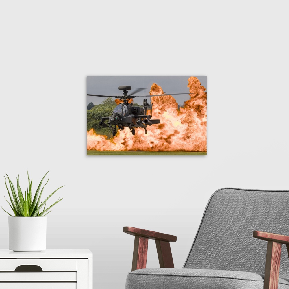 A modern room featuring A British Army WAH-64D Apache in front of a wall of fire at RAF Fairford in the United Kingdom.