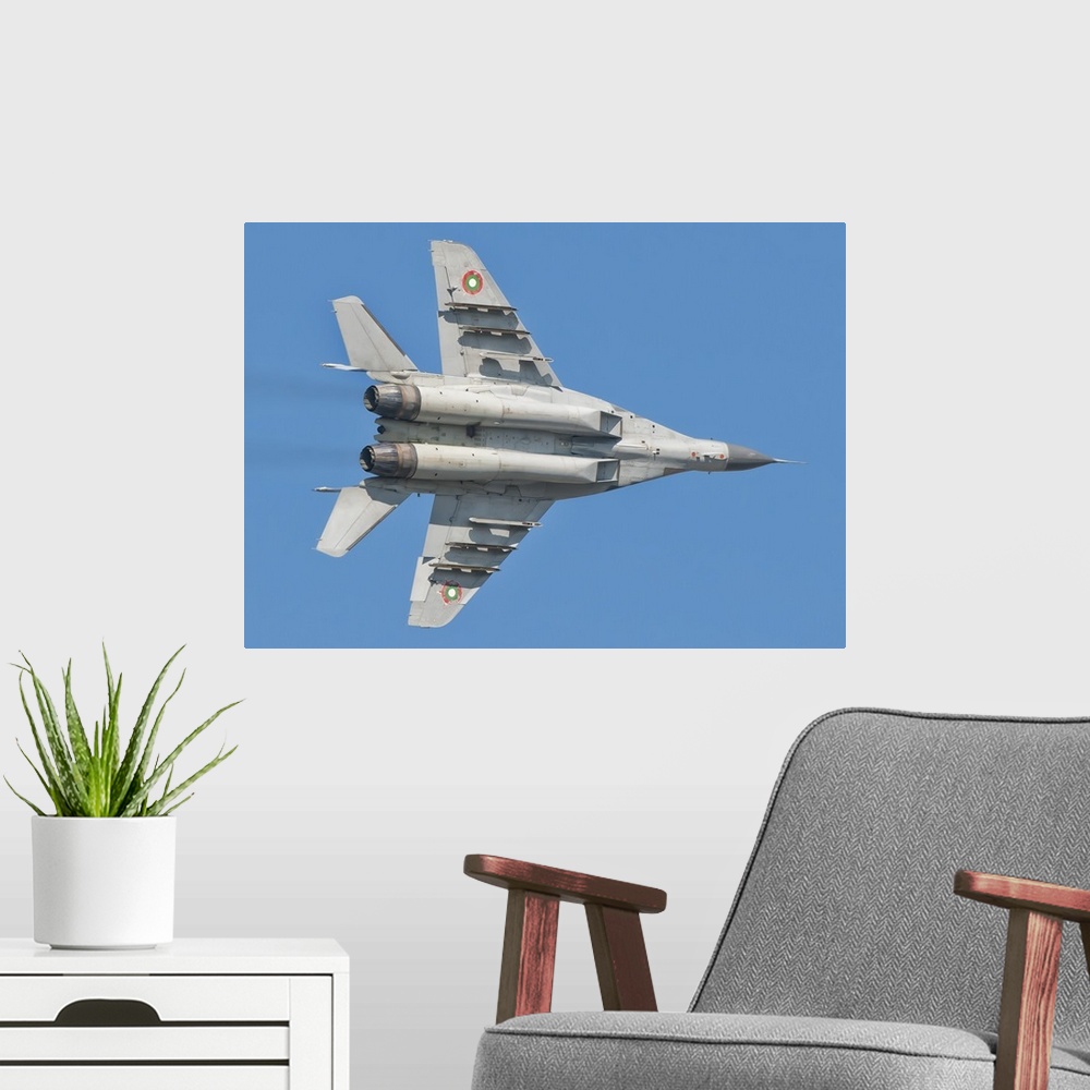 A modern room featuring A Bulgarian Air Force MiG-29 in flight over Bulgaria.