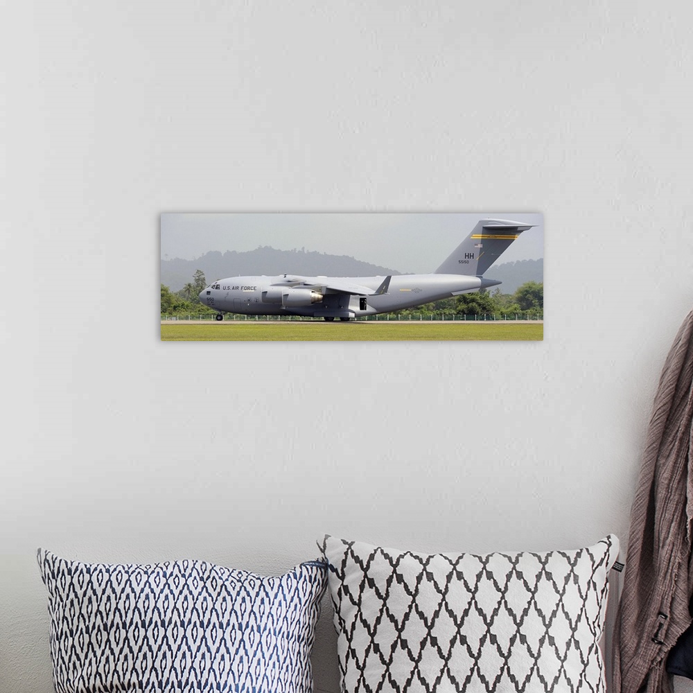 A bohemian room featuring March 29, 2013 - A Boeing C-17 Globemaster III of the U.S. Air Force at Langkawi Airport, Malaysia.