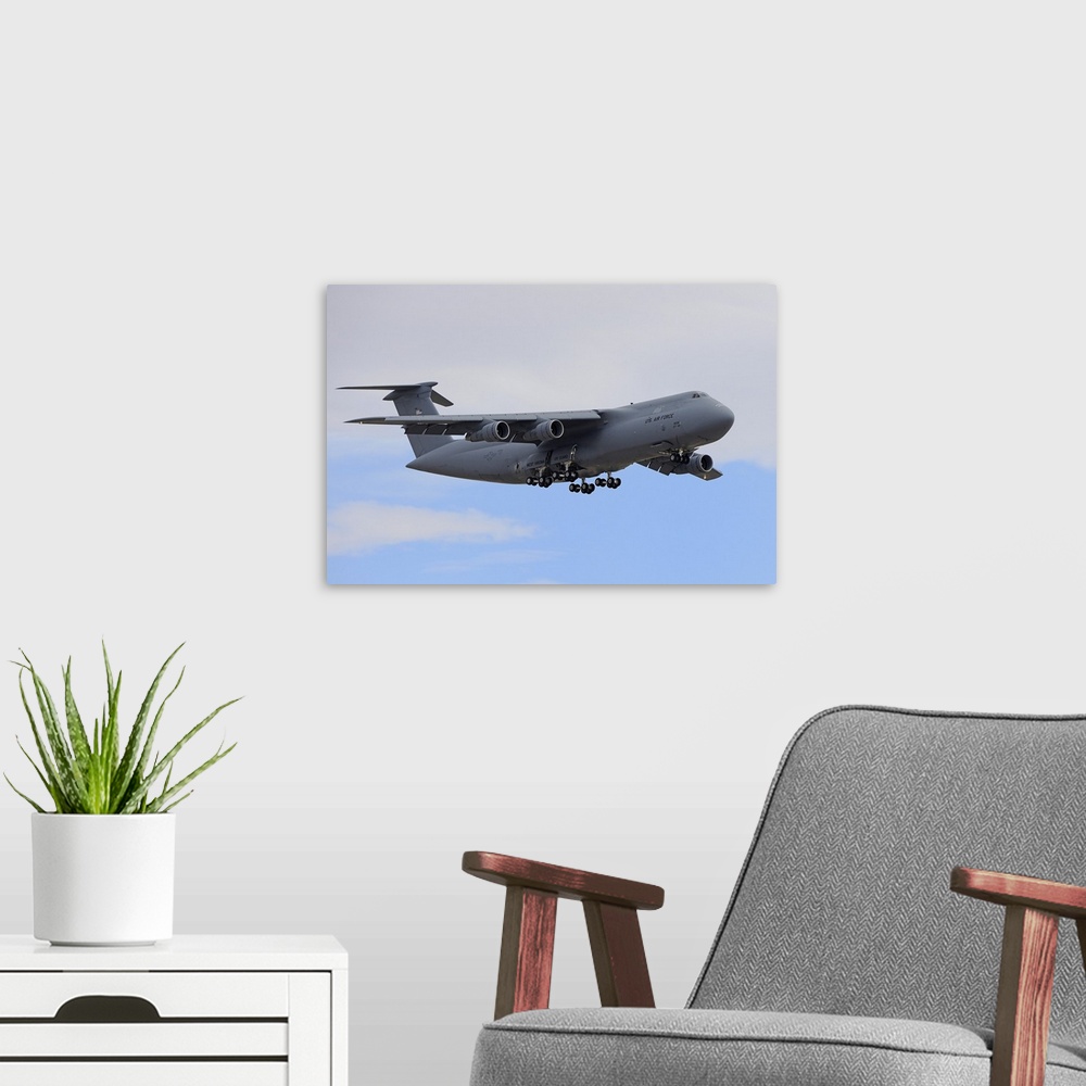 A modern room featuring November 8, 2012 - A C-5 Galaxy of the West Virginia Air National Guard in flight over Nevada.