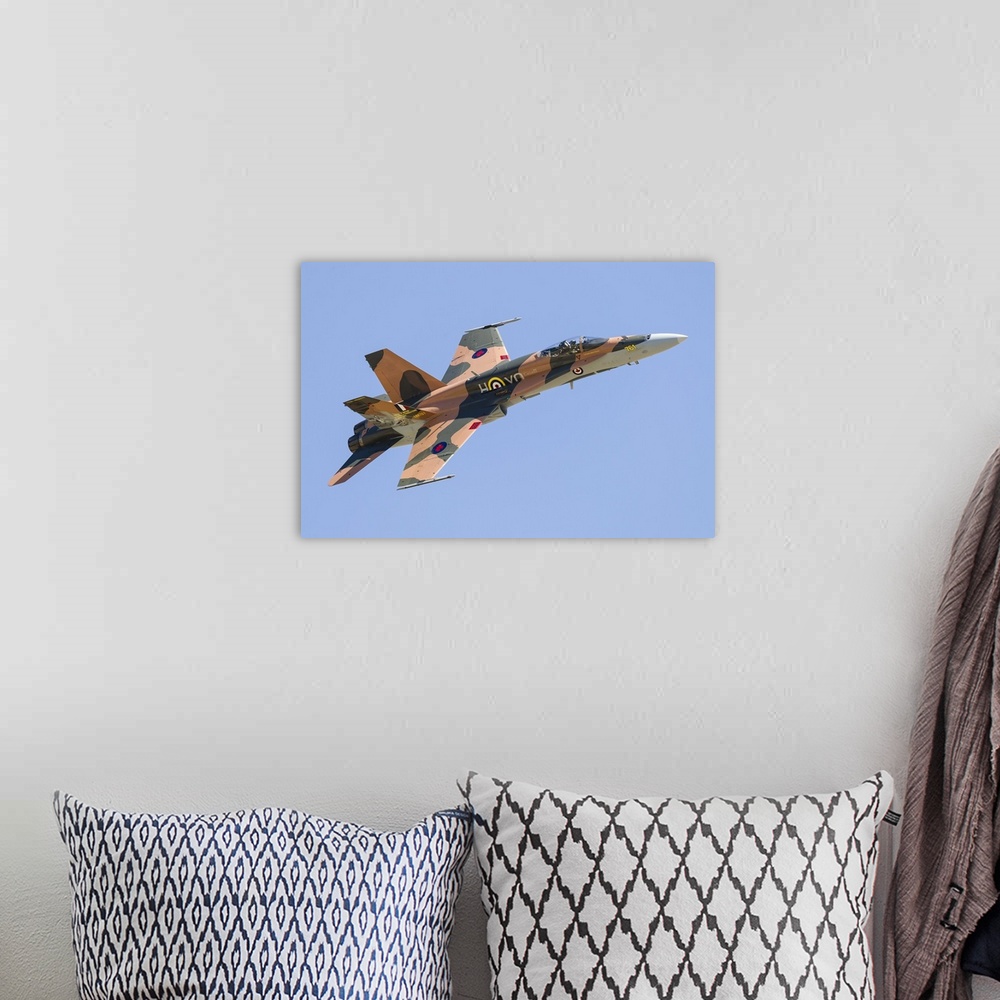 A bohemian room featuring A CF-188 Hornet of the Royal Canadian Air Force in 70th anniversary markings.