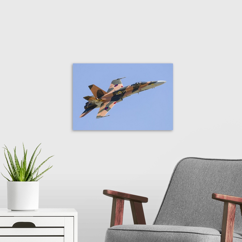A modern room featuring A CF-188 Hornet of the Royal Canadian Air Force in 70th anniversary markings.