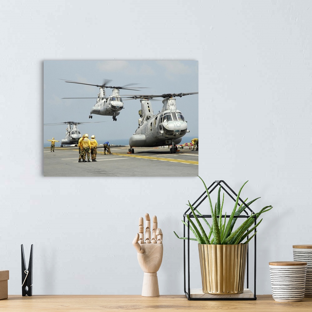 A bohemian room featuring February 13, 2011 - A U.S. Marine Corps CH-46E Sea Knight helicopter takes off from the flight de...