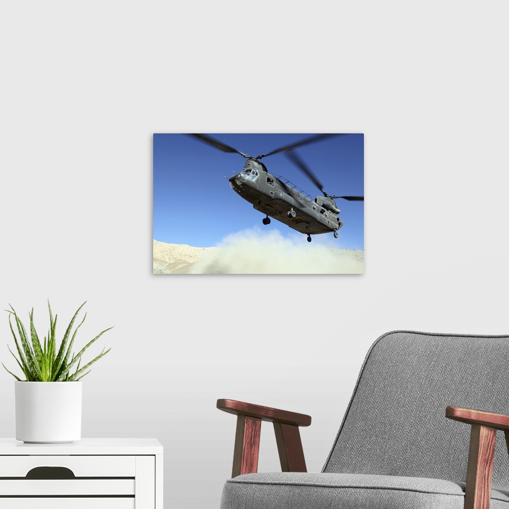 A modern room featuring January 9, 2011 - A CH-47 Chinook comes in for a landing to pick up soldiers following a mission ...