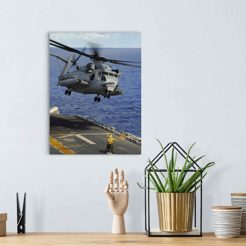 A bohemian room featuring Philippine Sea, September 14, 2010 - A CH-53E Sea Stallion helicopter takes off from the forward-...