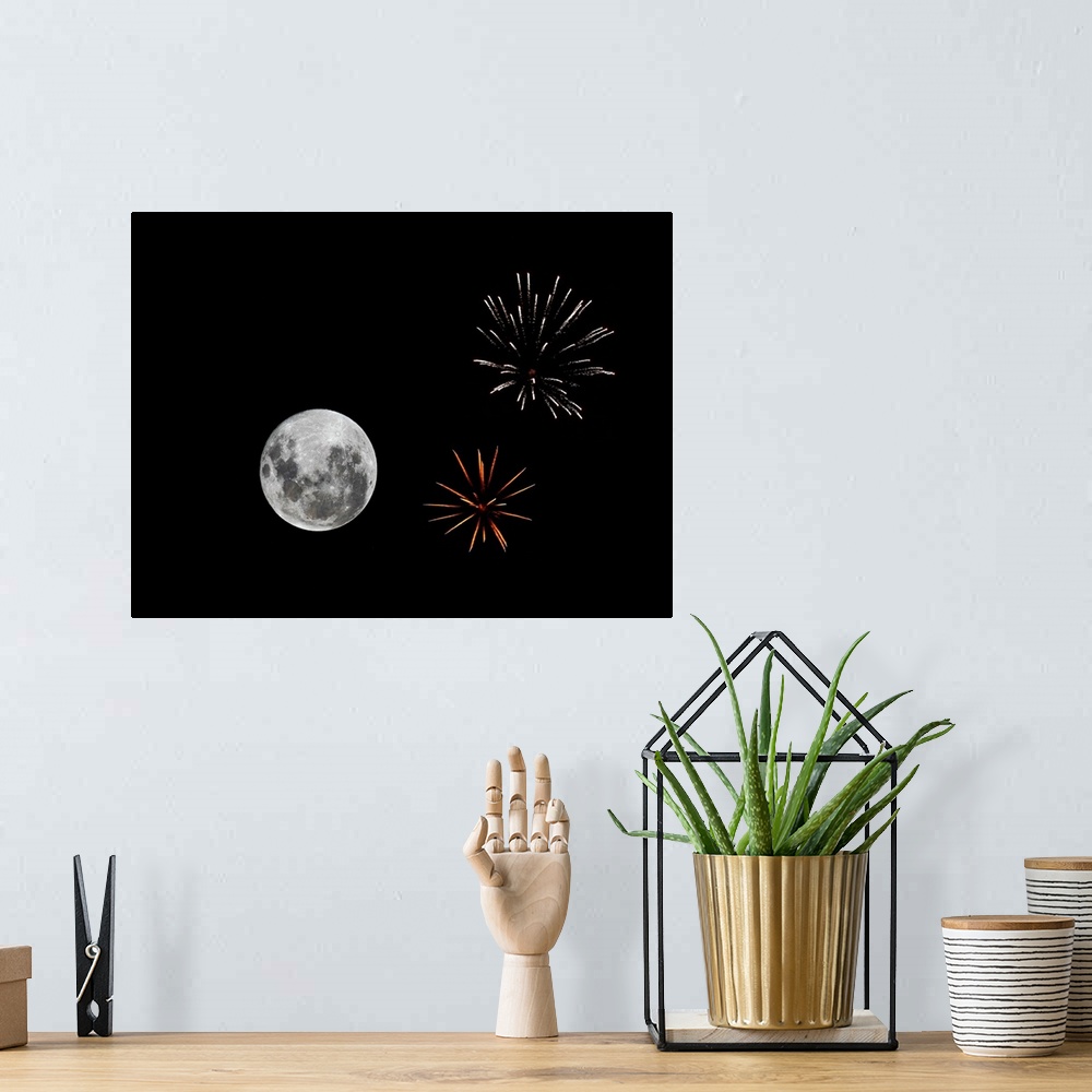 A bohemian room featuring A composite image with fireworks and the new Moon from December 2009 in Buenos Aires, Argentina.