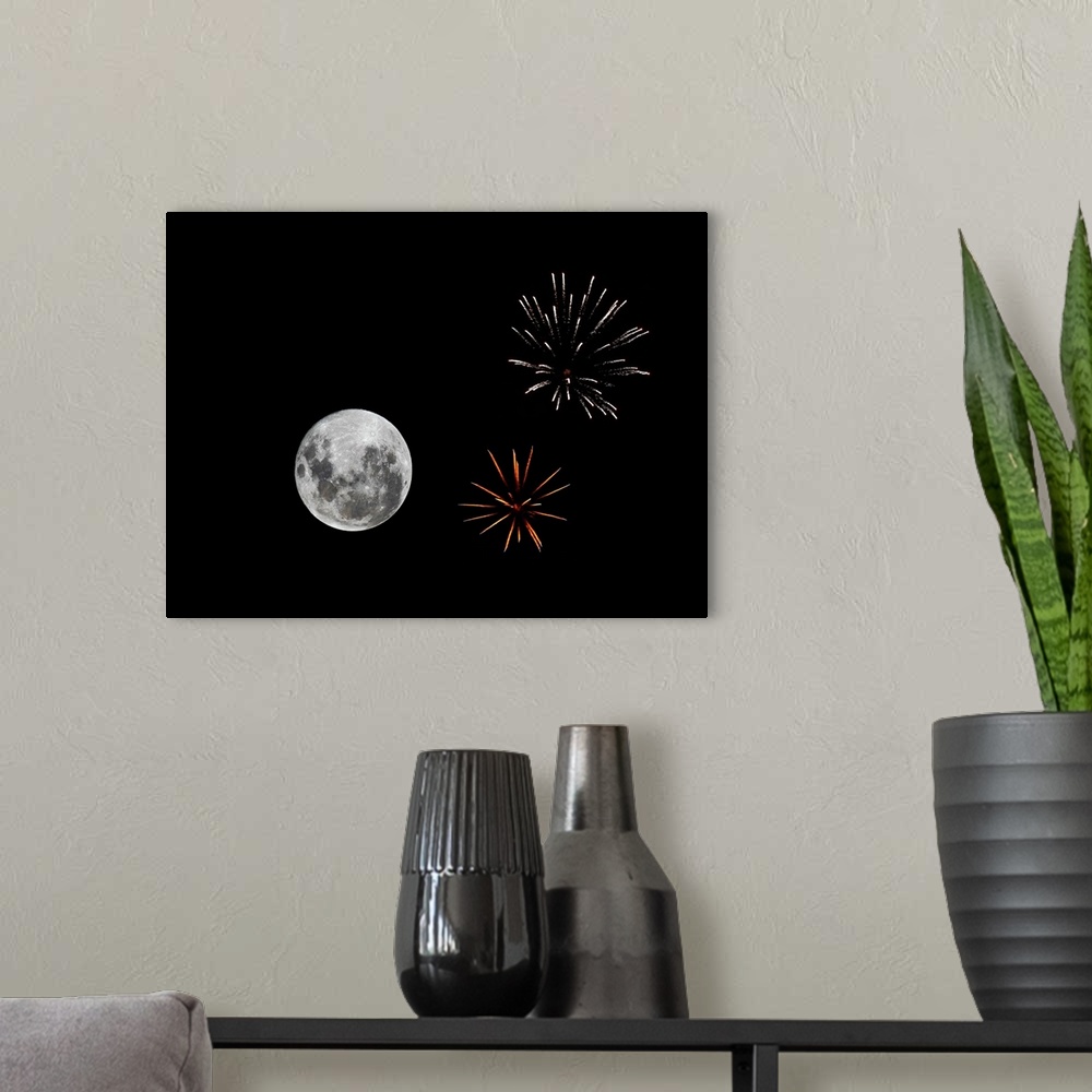 A modern room featuring A composite image with fireworks and the new Moon from December 2009 in Buenos Aires, Argentina.