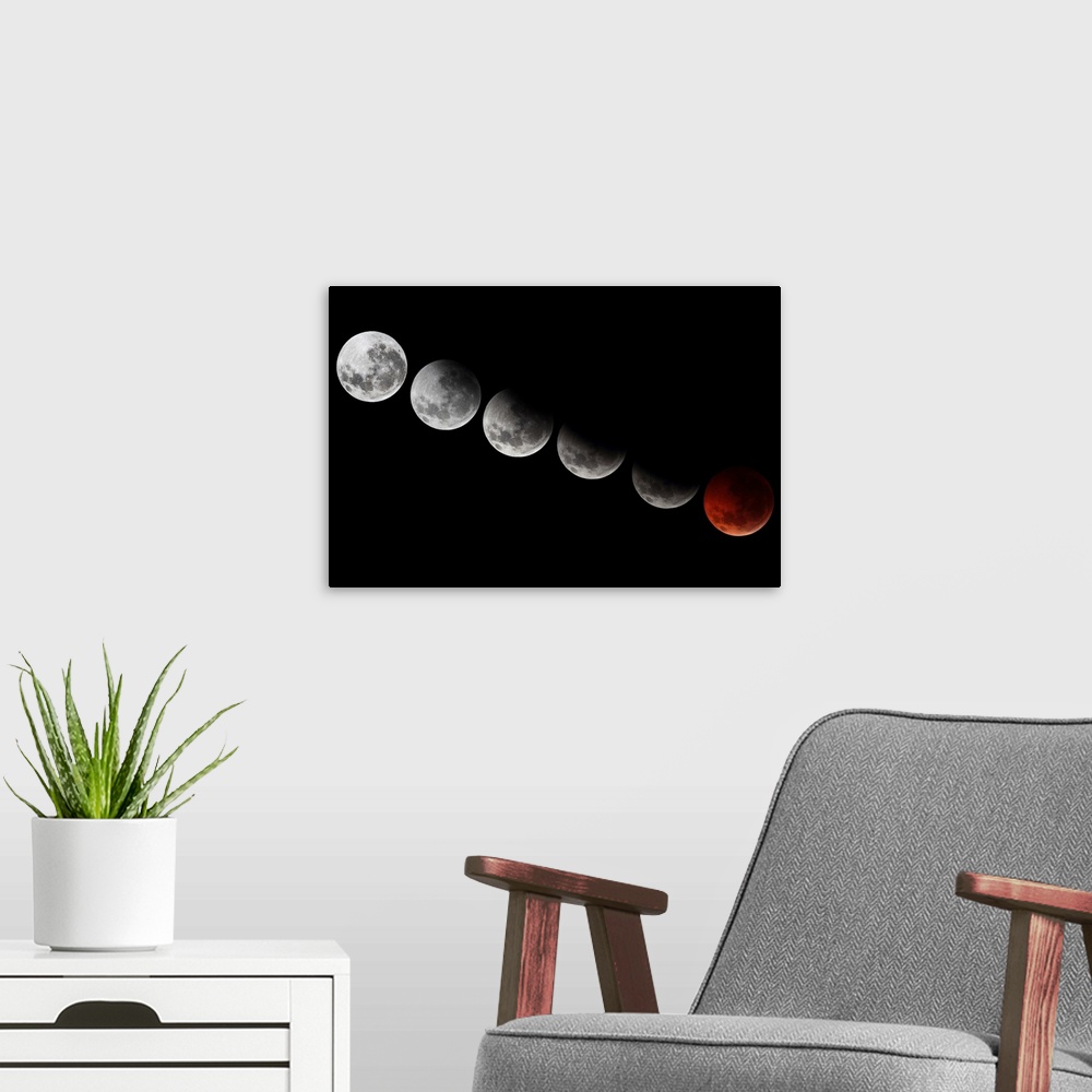 A modern room featuring A composite image showing different stages of the 2010 solstice total moon eclipse.