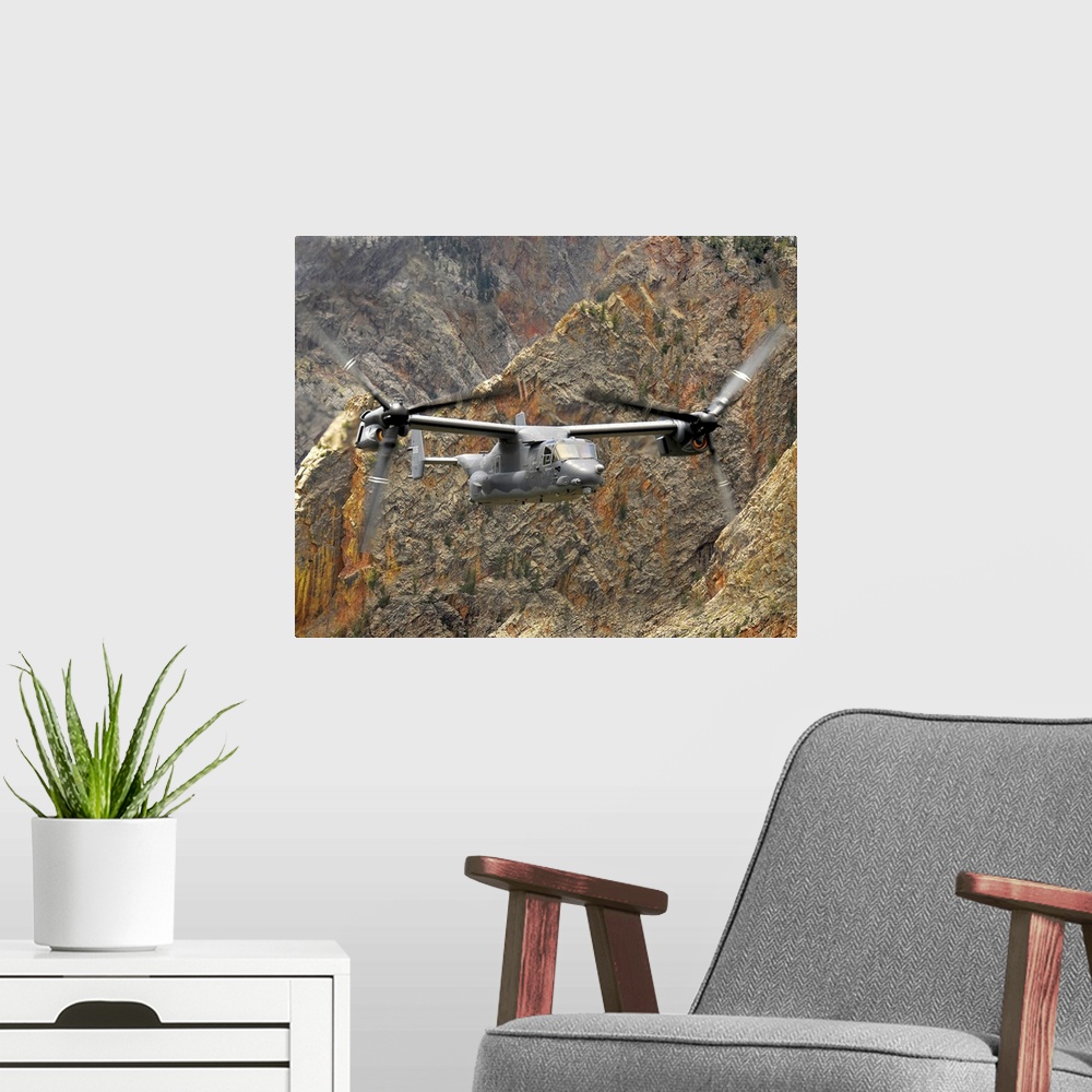 A modern room featuring A CV-22 Osprey flies over the canyons in northern New Mexico.