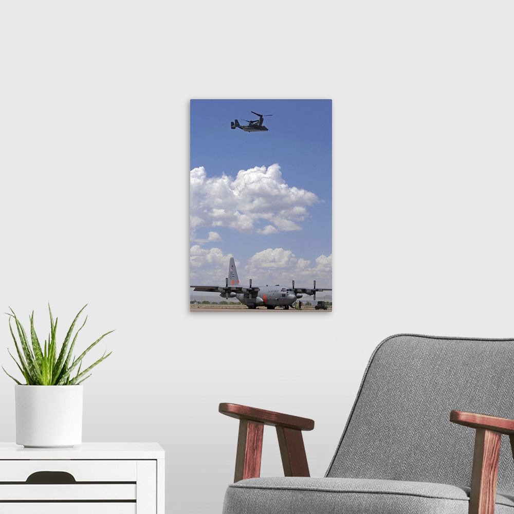 A modern room featuring A CV22 Osprey flies over a C130 Hercules