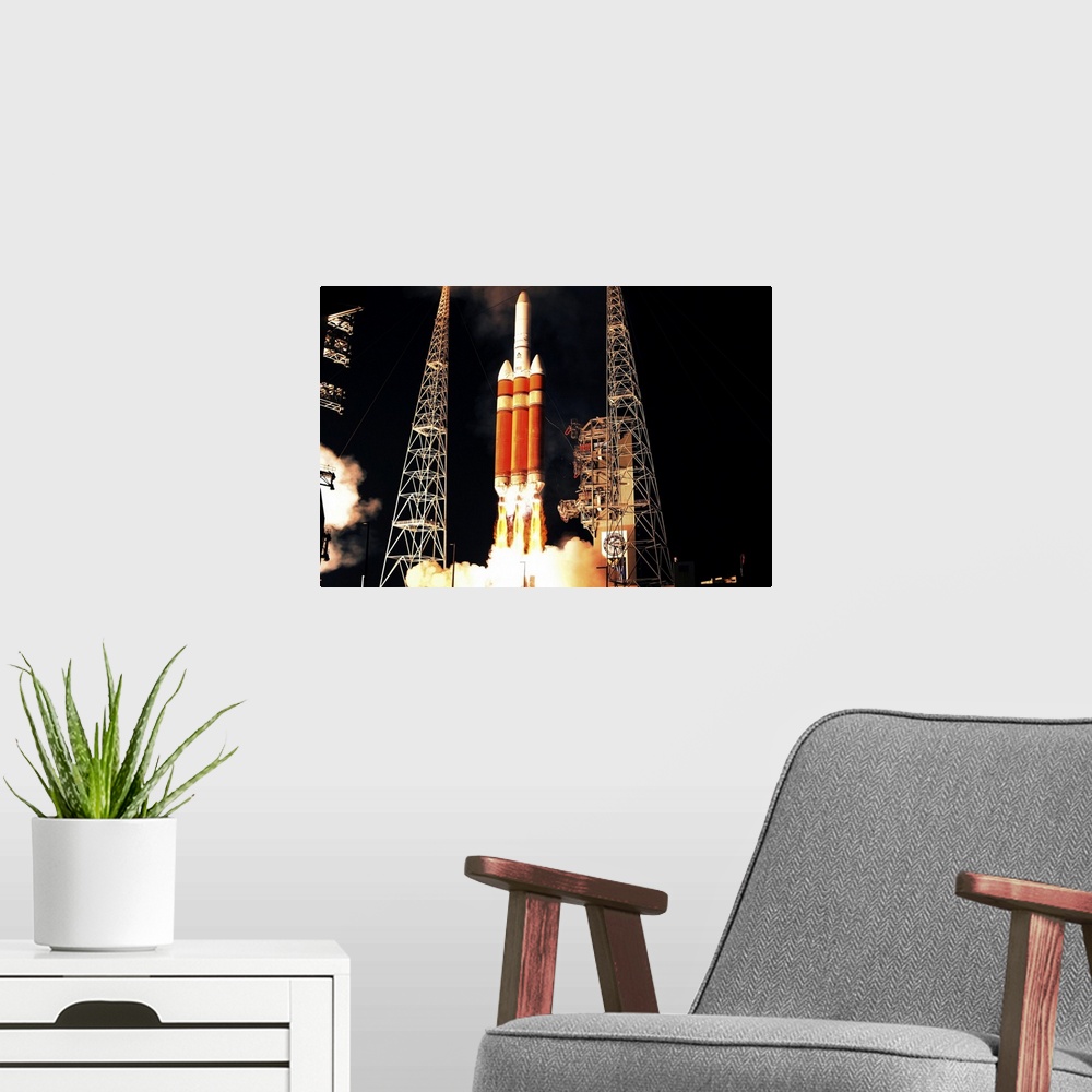 A modern room featuring A Delta IV Heavy rocket lifts off