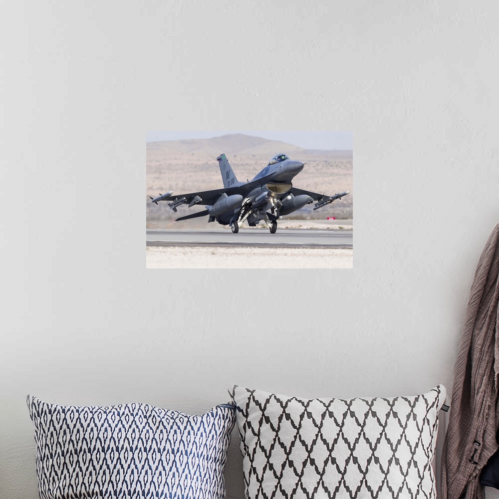 A bohemian room featuring A F-15E Strike Eagle of the U.S. Air Force uses aero braking after landing at Nellis Air Force Ba...