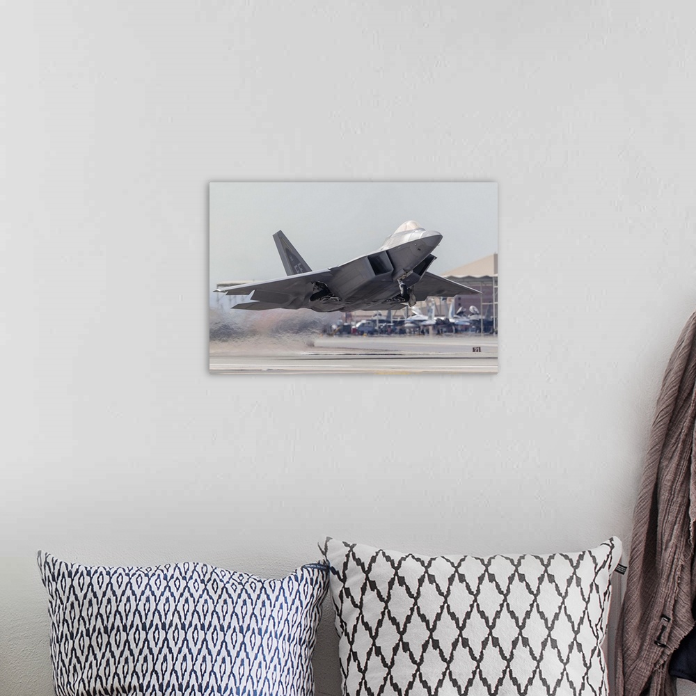 A bohemian room featuring A F-22 Raptor of the U.S. Air Force launches from Nellis Air Force Base, Nevada.