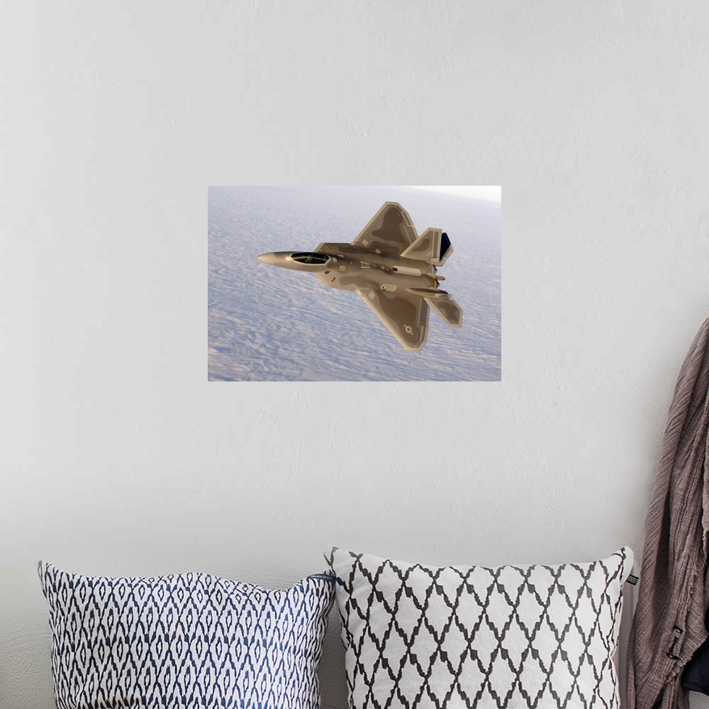 A bohemian room featuring A F-22A Raptor aggressively banks.