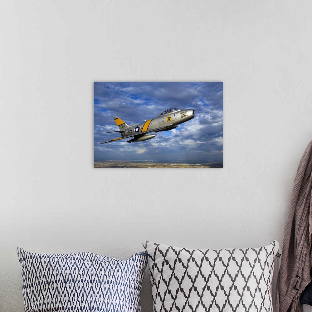 A bohemian room featuring A F-86 Sabre jet in flight over Glendale, Arizona.
