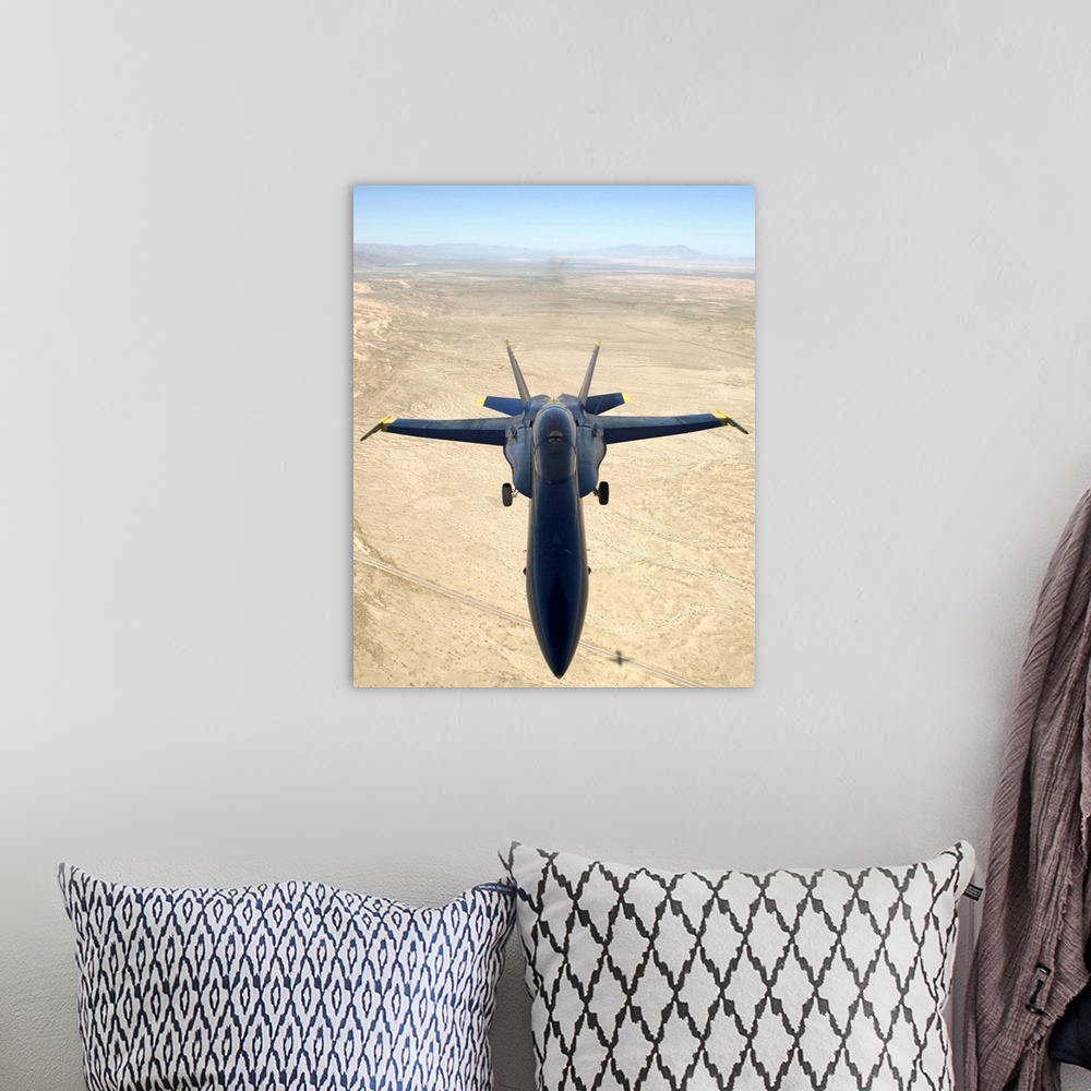 A bohemian room featuring A F/A18A Hornet flys over the desert landscape of Imperial Valley