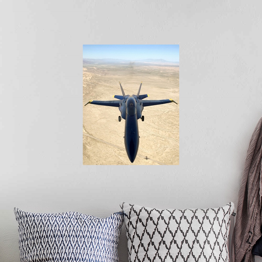 A bohemian room featuring A F/A18A Hornet flys over the desert landscape of Imperial Valley