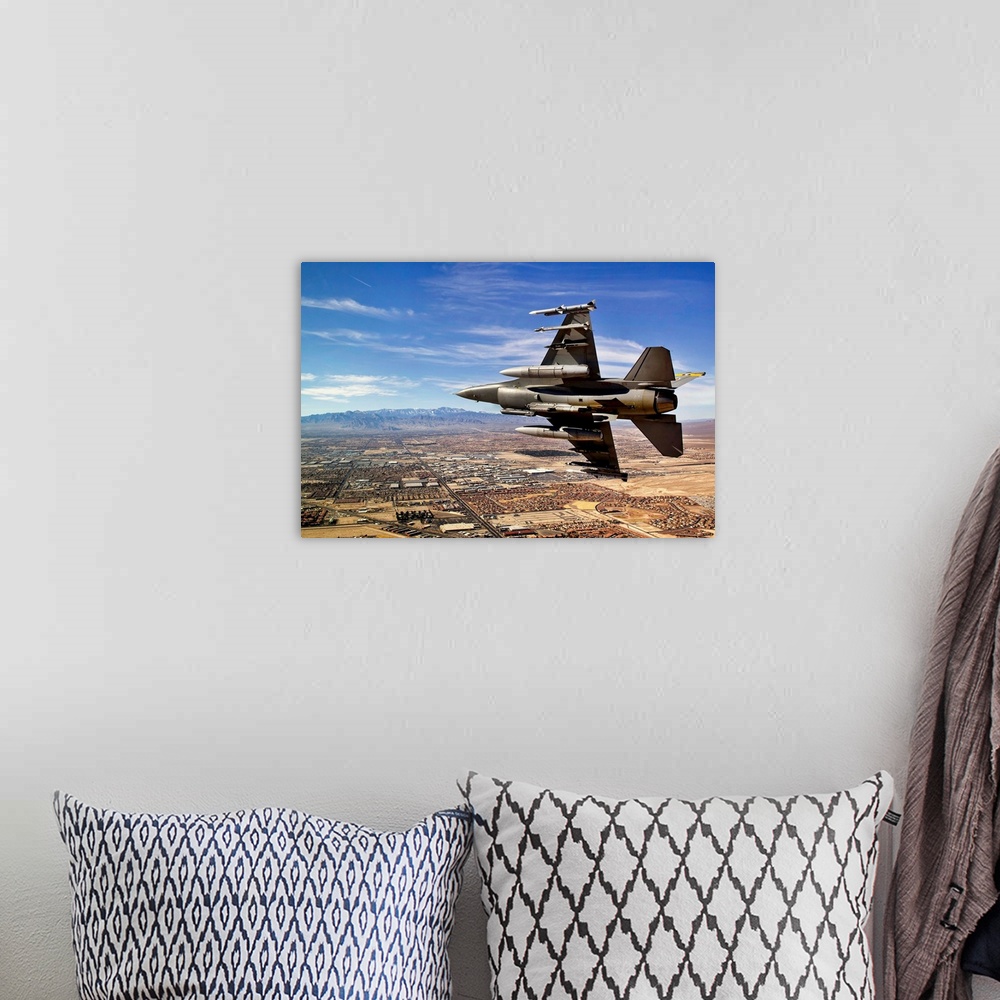 A bohemian room featuring A fighter jet breaks right on a final approach over northern Las Vegas during day three of Red Fl...