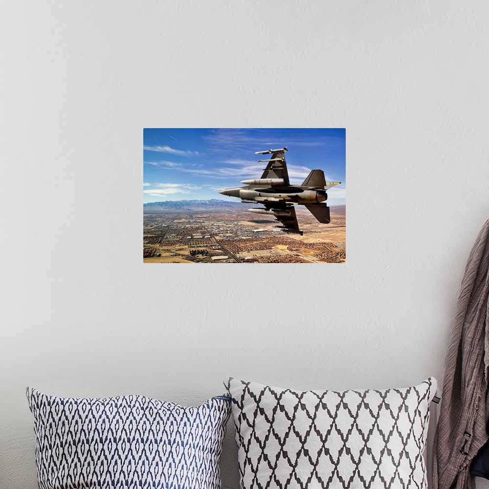 A bohemian room featuring A fighter jet breaks right on a final approach over northern Las Vegas during day three of Red Fl...