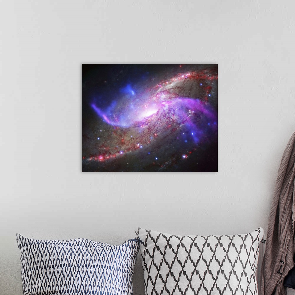 A bohemian room featuring A galactic light show in spiral galaxy NGC 4258, also known as M106, about 23 million light years...