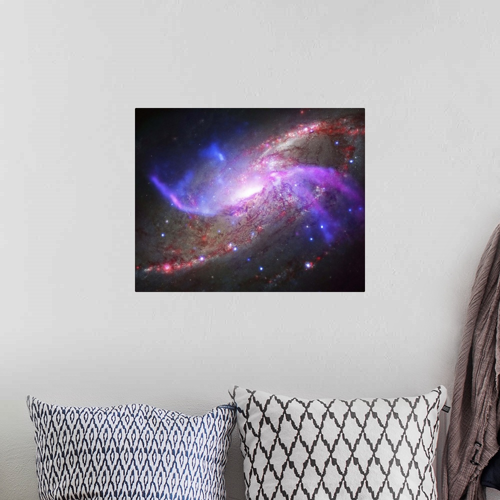 A bohemian room featuring A galactic light show in spiral galaxy NGC 4258, also known as M106, about 23 million light years...