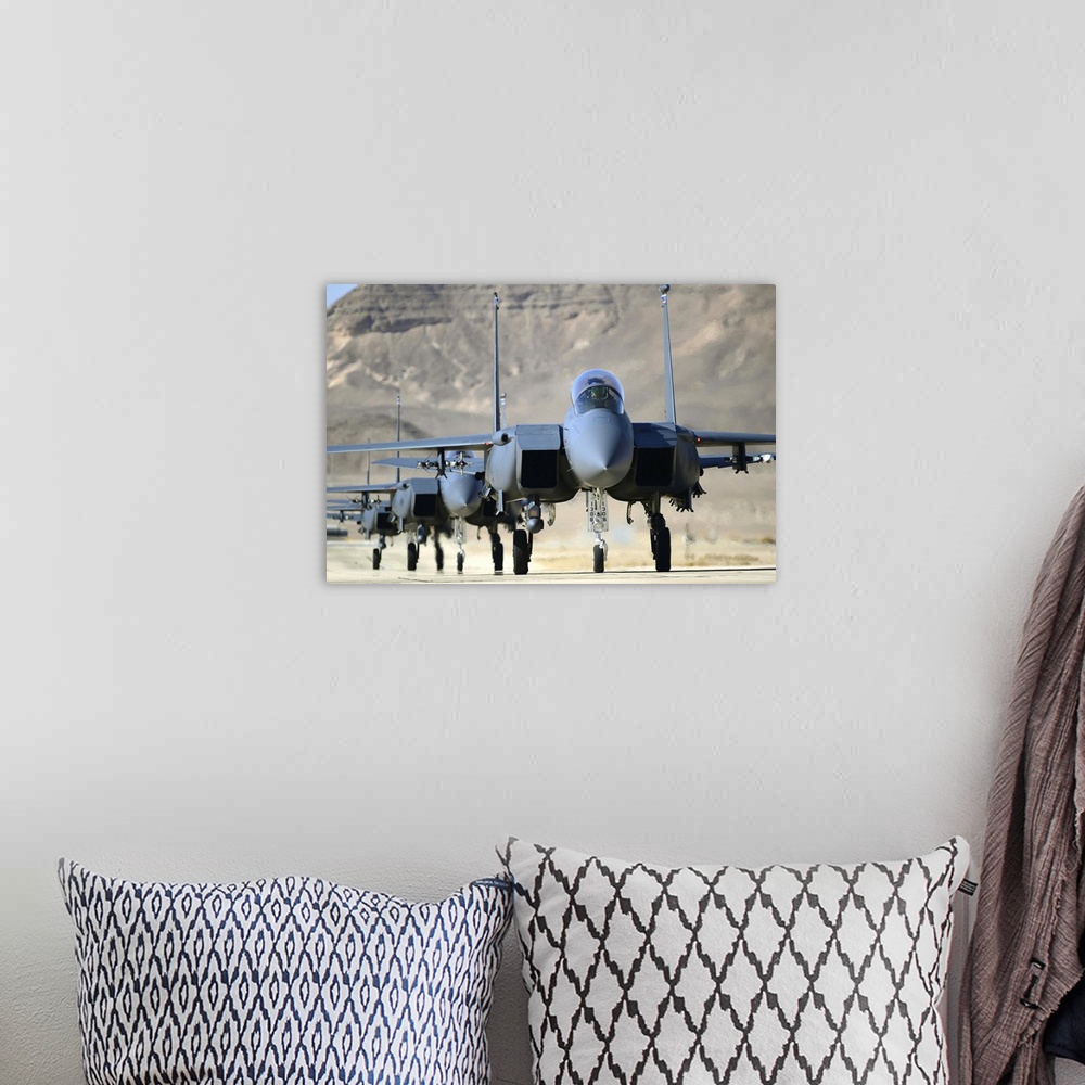 A bohemian room featuring November 26, 2013 - A group of F-15E Strike Eagles taxi following a combat mission during Blue Fl...