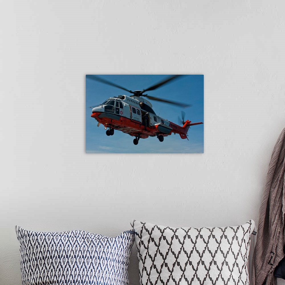 A bohemian room featuring A Hong Kong Government Flying Service AS 332 L2 Super Puma.