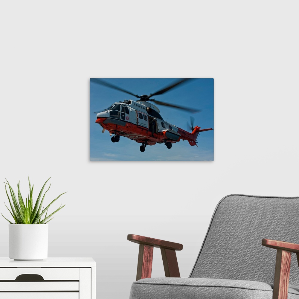 A modern room featuring A Hong Kong Government Flying Service AS 332 L2 Super Puma.