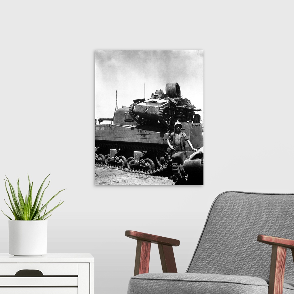 A modern room featuring A Japanese light tank sits atop the medium tank Killer, 1944.
