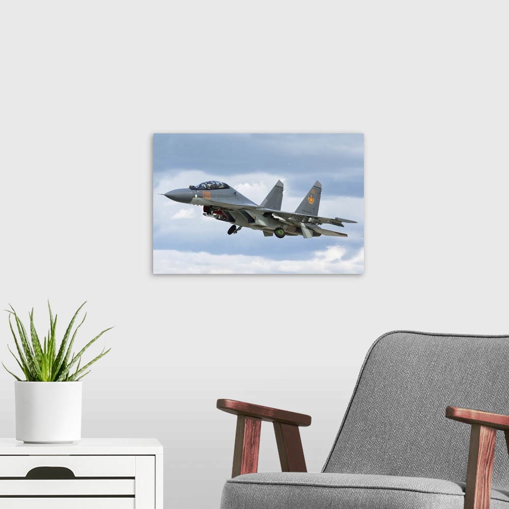 A modern room featuring A Kazakhstan Air Defense Forces Su-30SM fighter-bomber plane.