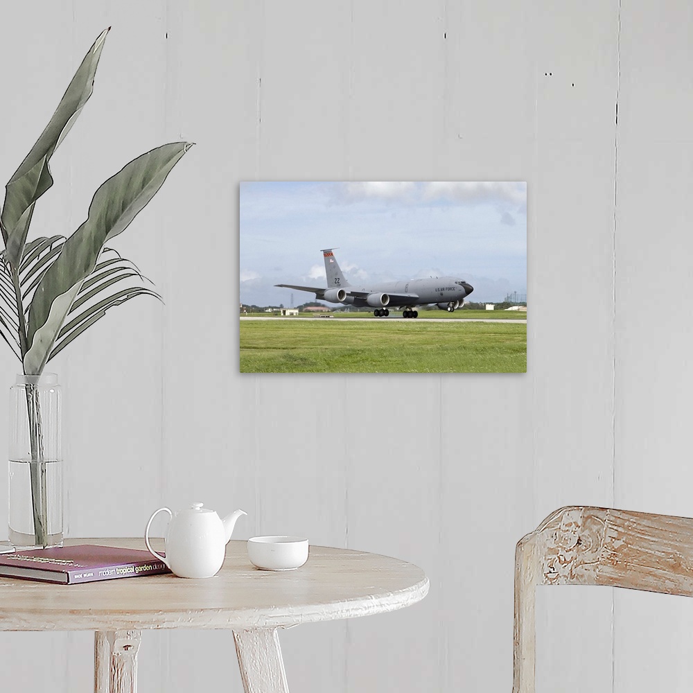A farmhouse room featuring A KC-135 Stratotanker from the 18th Wing at Kadena Air Base, Okinawa, Japan, touches down on the ...
