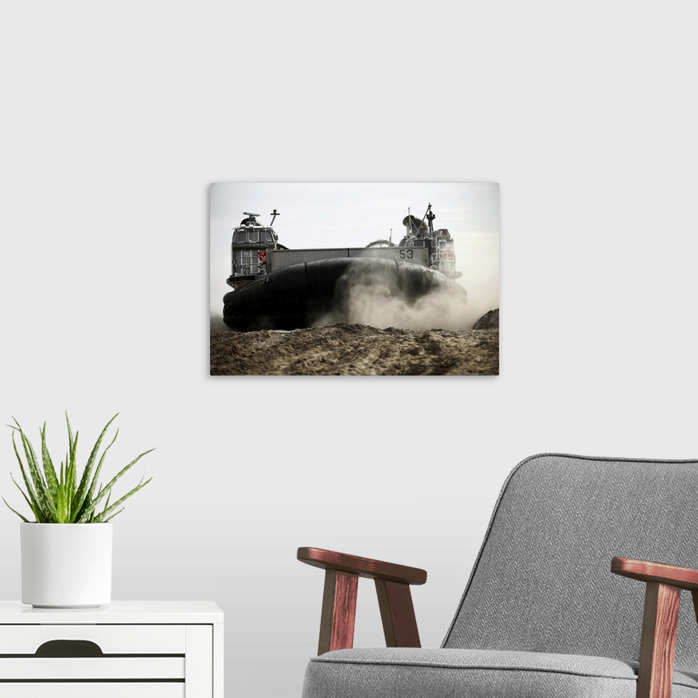 A modern room featuring Camp Lejeune, North Carolina, February 6, 2012 - A landing craft, air cushion (LCAC) prepares to ...